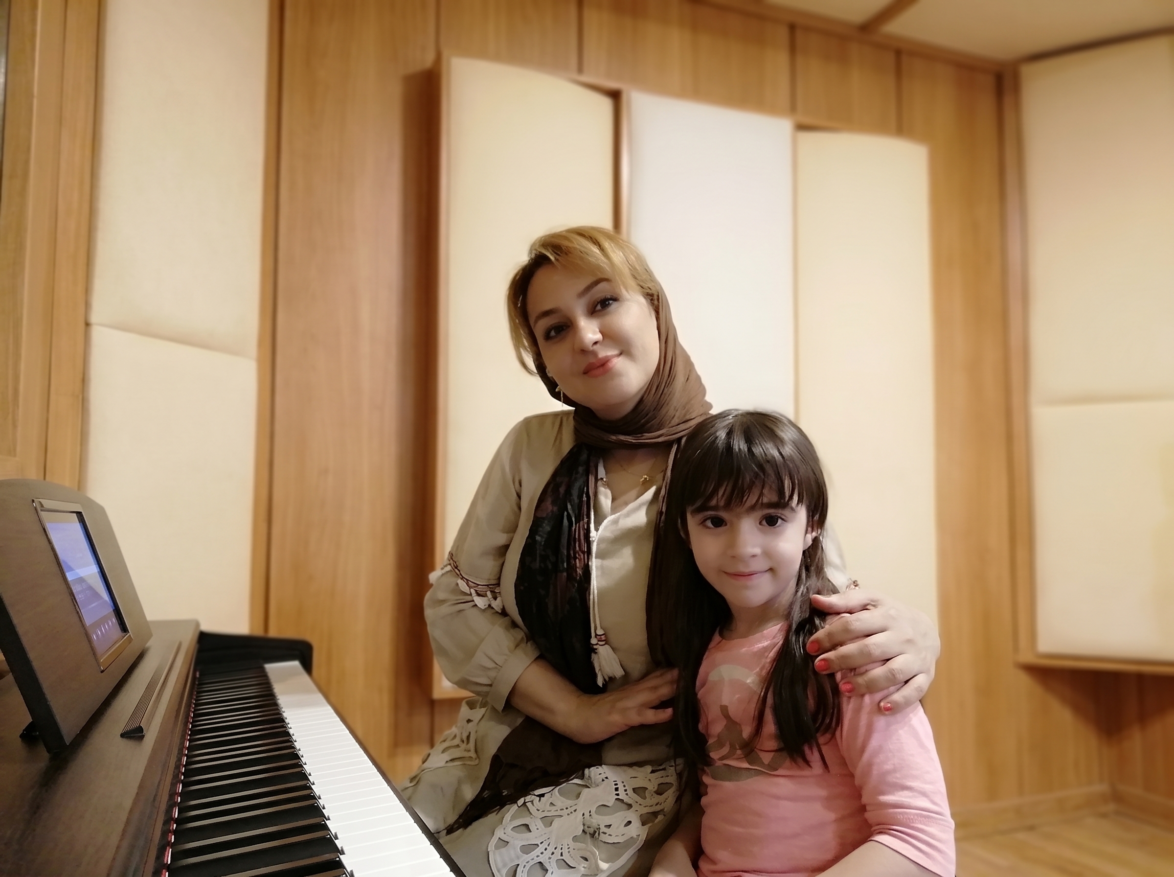 Adult woman learning piano