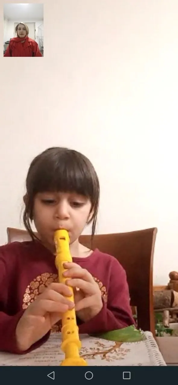 Child playing the recorder
